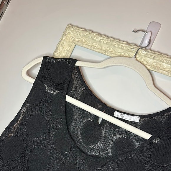 ZOÉ | Black Sleeveless Top with Sheer Hem - Picture 5 of 12